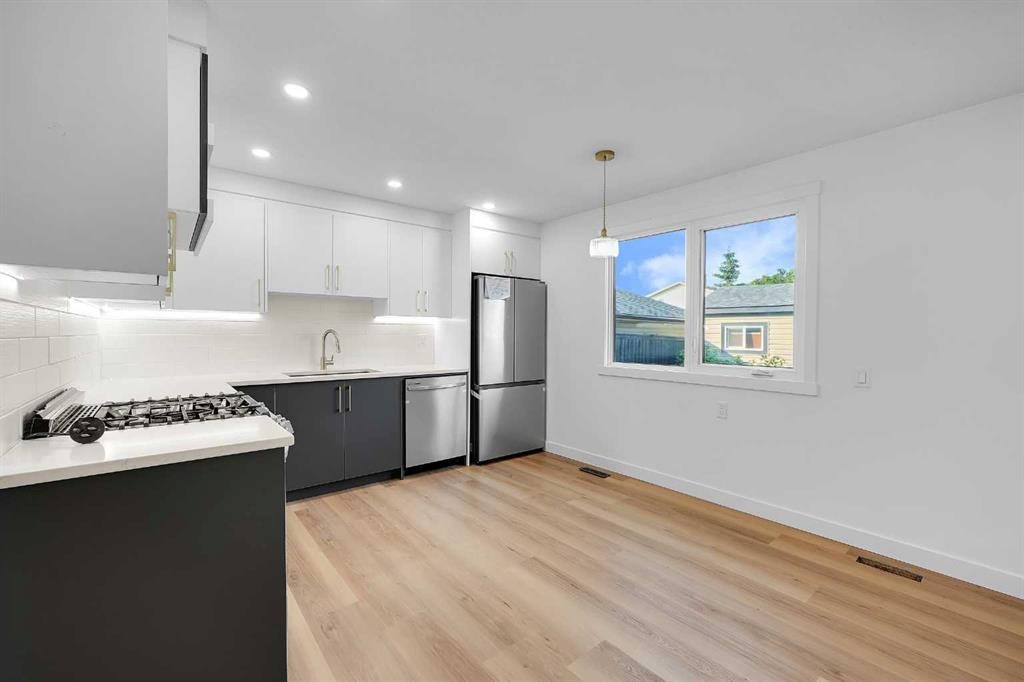 16 Abalone Crescent Ne, Calgary, AB - Indoor Photo Showing Kitchen With Upgraded Kitchen