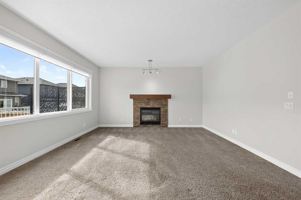 38 Evansfield Terrace Nw, Calgary, AB - Indoor Photo Showing Living Room With Fireplace