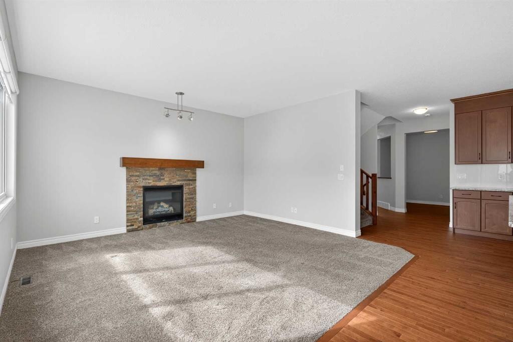 38 Evansfield Terrace Nw, Calgary, AB - Indoor Photo Showing Living Room With Fireplace