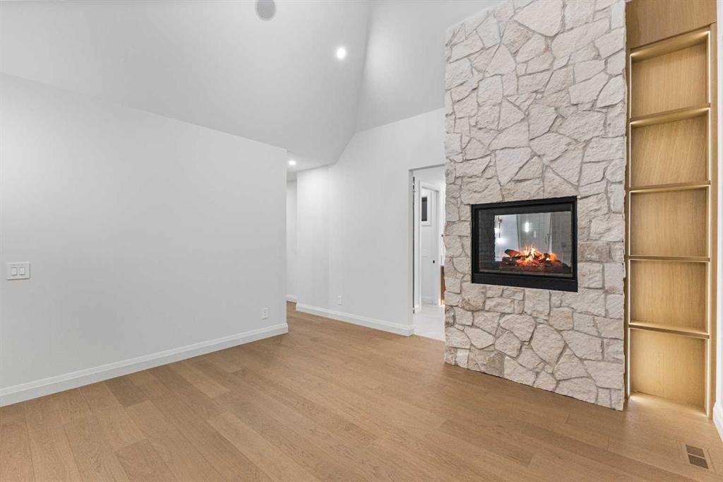 730 25 Avenue Nw, Calgary, AB - Indoor Photo Showing Other Room With Fireplace