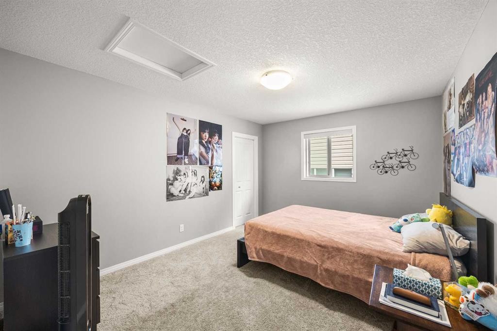 208 Panton Road Nw, Calgary, AB - Indoor Photo Showing Bedroom