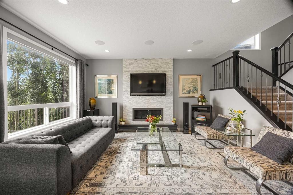 208 Panton Road Nw, Calgary, AB - Indoor Photo Showing Living Room With Fireplace