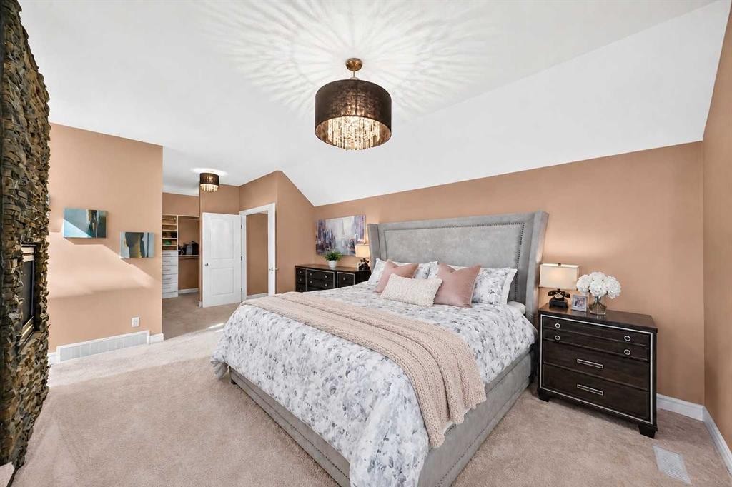 116 Panatella Rise Nw, Calgary, AB - Indoor Photo Showing Bedroom