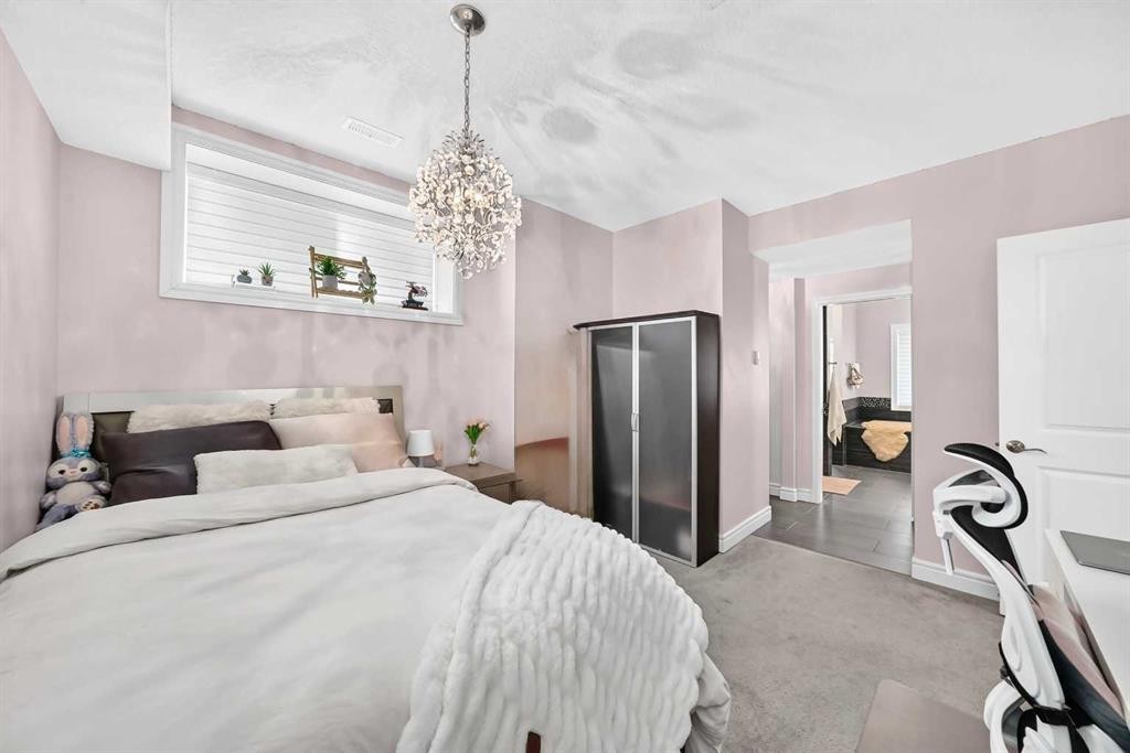 116 Panatella Rise Nw, Calgary, AB - Indoor Photo Showing Bedroom