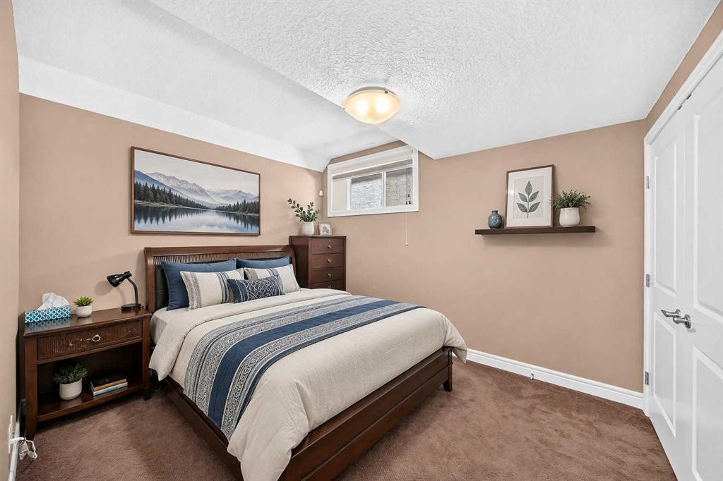 116 Panatella Rise Nw, Calgary, AB - Indoor Photo Showing Bedroom