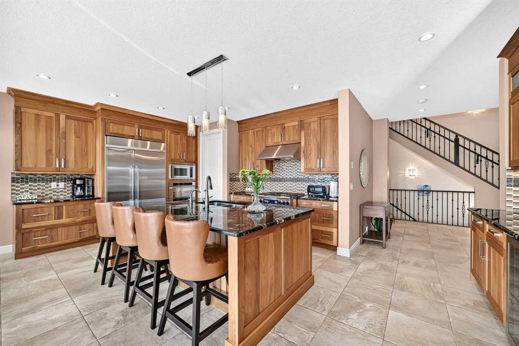 116 Panatella Rise Nw, Calgary, AB - Indoor Photo Showing Kitchen With Stainless Steel Kitchen With Upgraded Kitchen