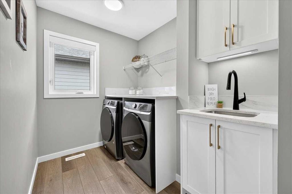 421 Magnolia Way Se, Calgary, AB - Indoor Photo Showing Laundry Room