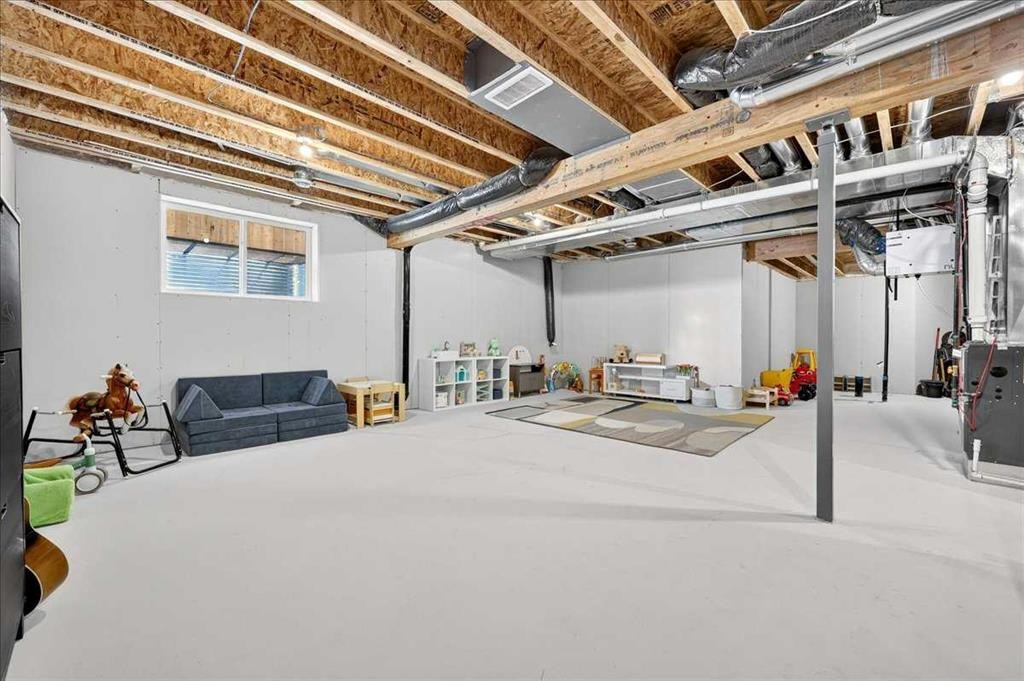 421 Magnolia Way Se, Calgary, AB - Indoor Photo Showing Basement