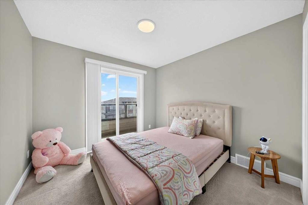 79-230 Seton Passage Se, Calgary, AB - Indoor Photo Showing Bedroom