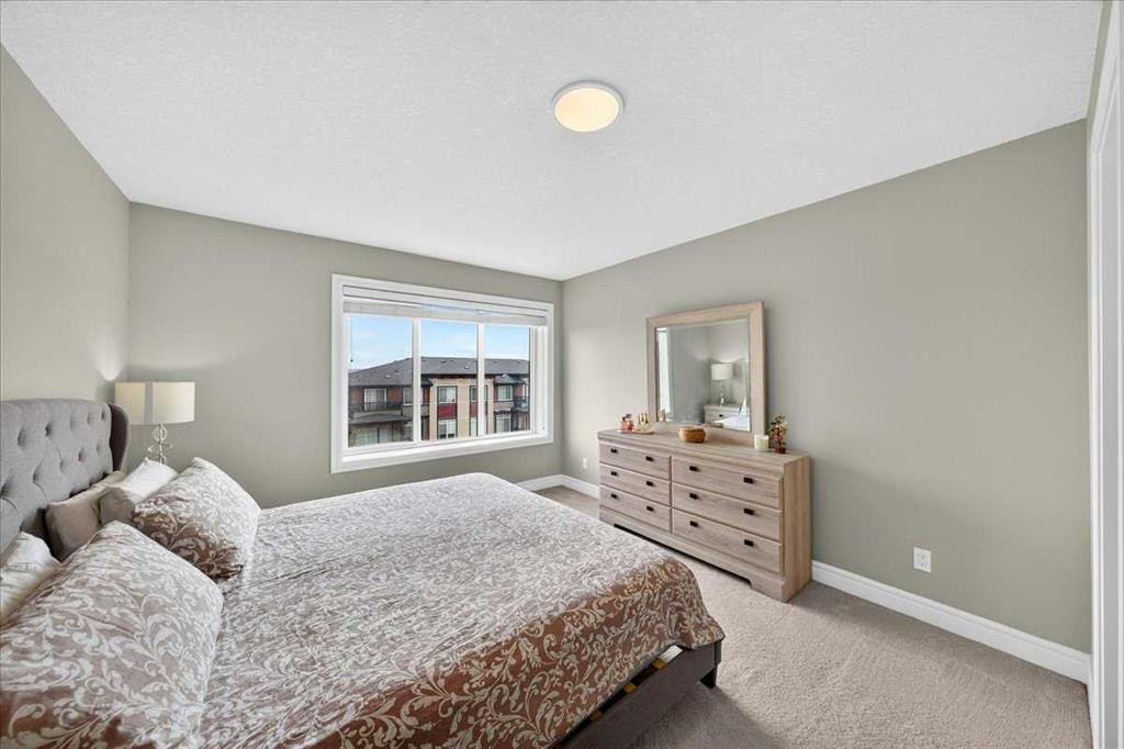 79-230 Seton Passage Se, Calgary, AB - Indoor Photo Showing Bedroom