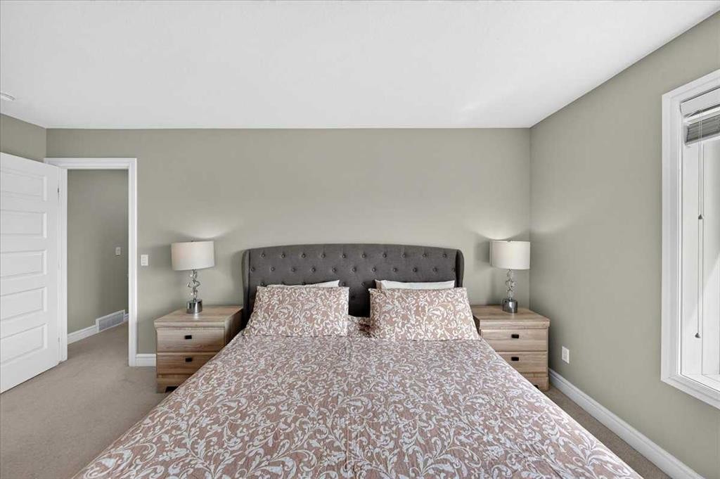 79-230 Seton Passage Se, Calgary, AB - Indoor Photo Showing Bedroom