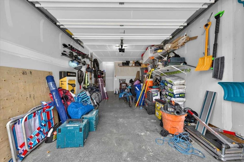 79-230 Seton Passage Se, Calgary, AB - Indoor Photo Showing Garage