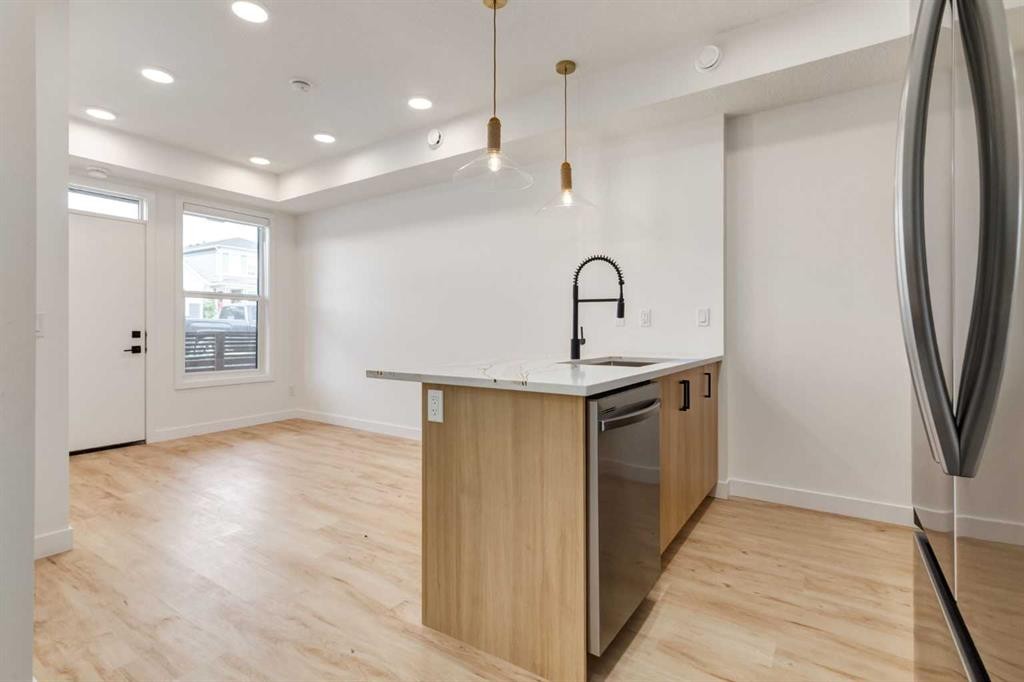 131 148 Avenue Nw, Calgary, AB - Indoor Photo Showing Kitchen With Upgraded Kitchen