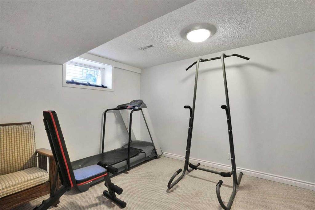 160 Sunhaven Close Se, Calgary, AB - Indoor Photo Showing Gym Room