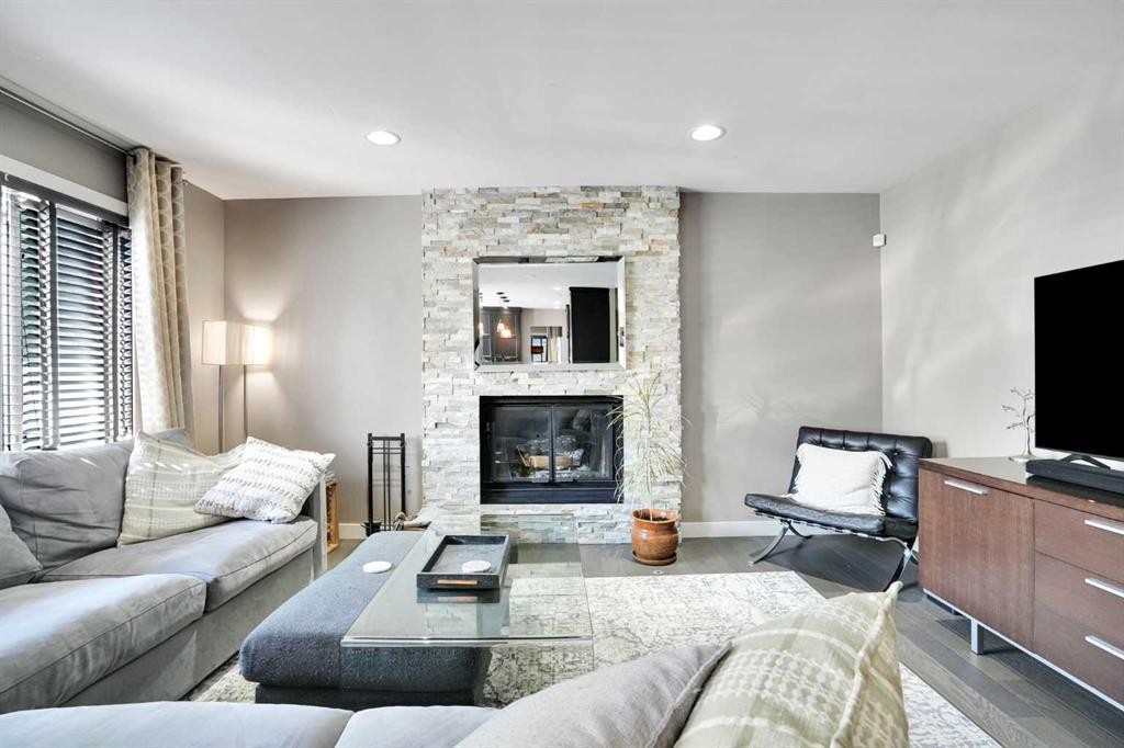 160 Sunhaven Close Se, Calgary, AB - Indoor Photo Showing Living Room With Fireplace