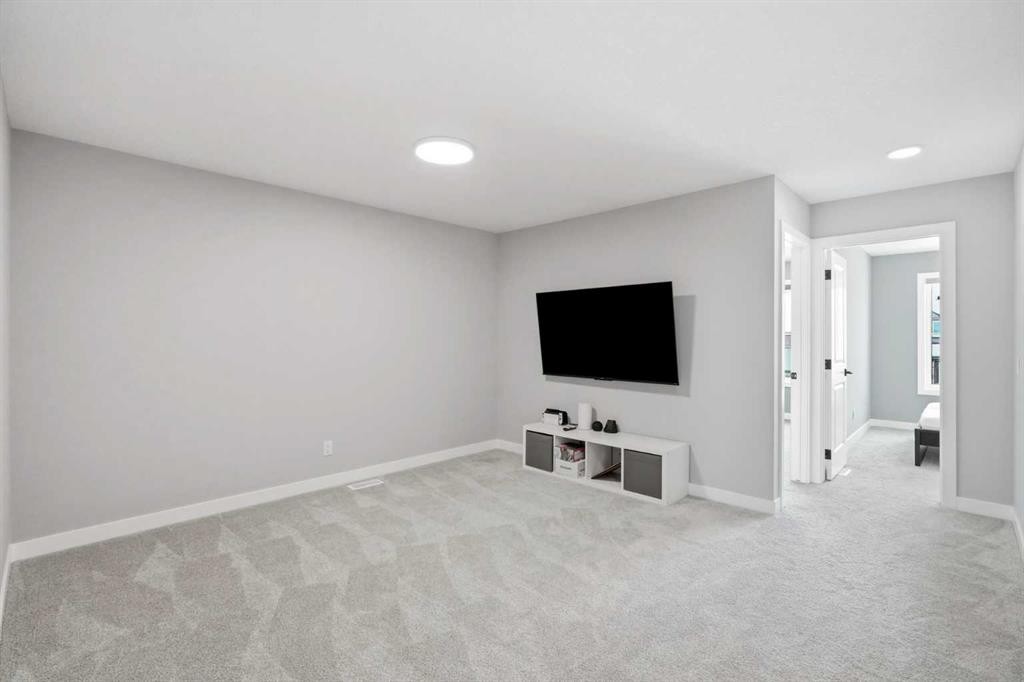 143 Belvedere Crescent Se, Calgary, AB - Indoor Photo Showing Other Room