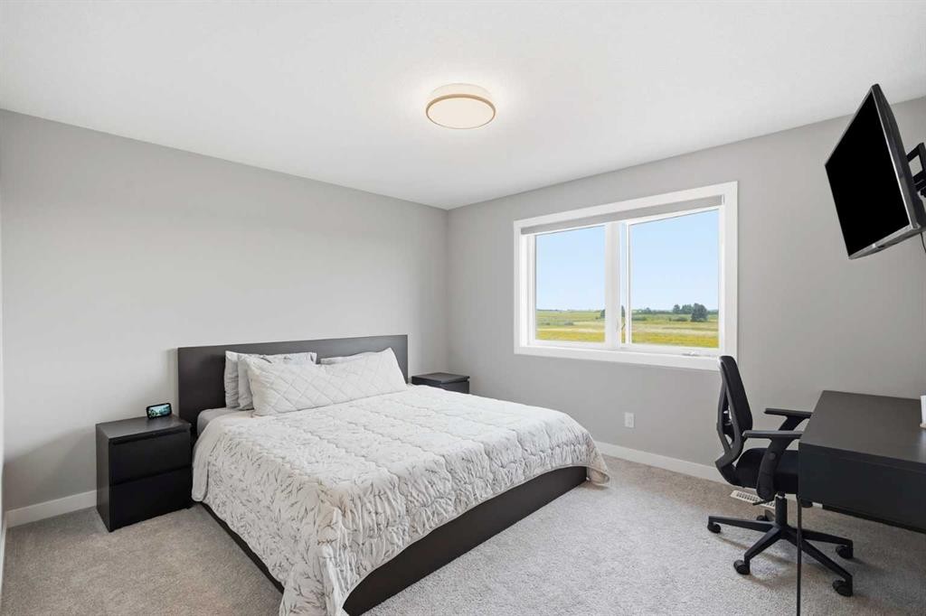 143 Belvedere Crescent Se, Calgary, AB - Indoor Photo Showing Bedroom