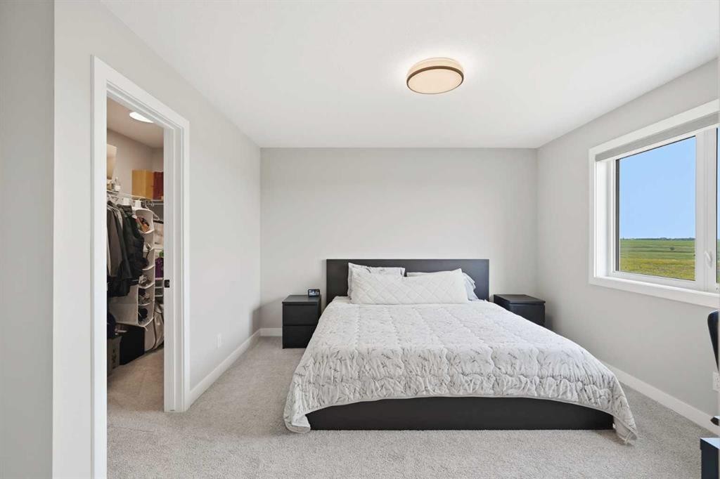 143 Belvedere Crescent Se, Calgary, AB - Indoor Photo Showing Bedroom