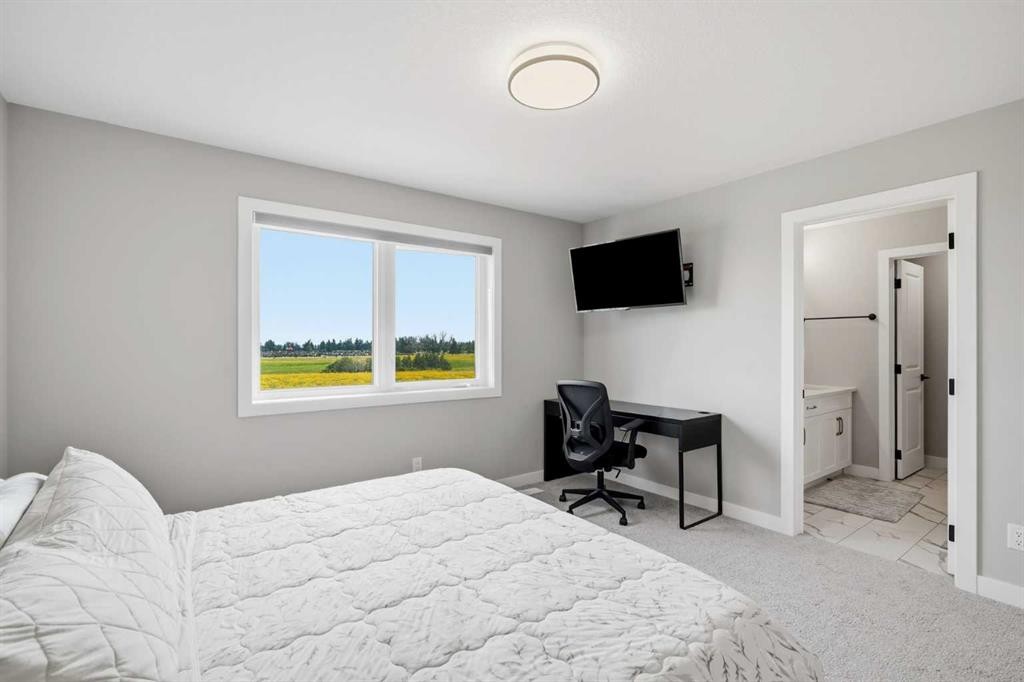 143 Belvedere Crescent Se, Calgary, AB - Indoor Photo Showing Bedroom