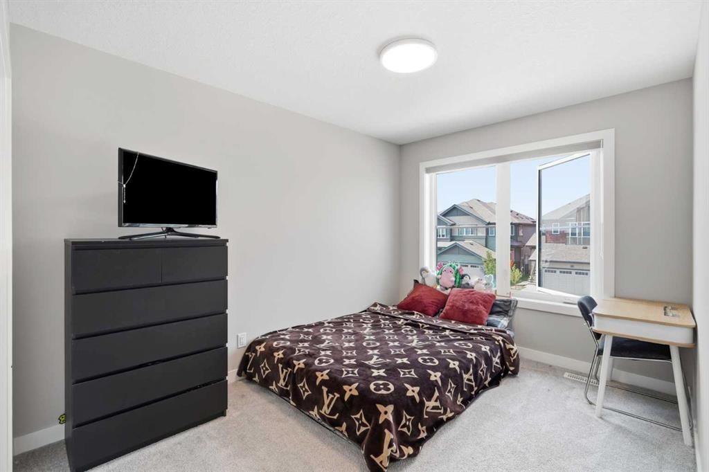143 Belvedere Crescent Se, Calgary, AB - Indoor Photo Showing Bedroom