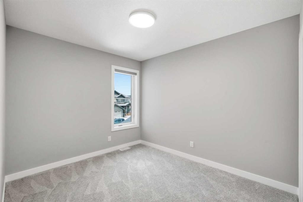 143 Belvedere Crescent Se, Calgary, AB - Indoor Photo Showing Other Room
