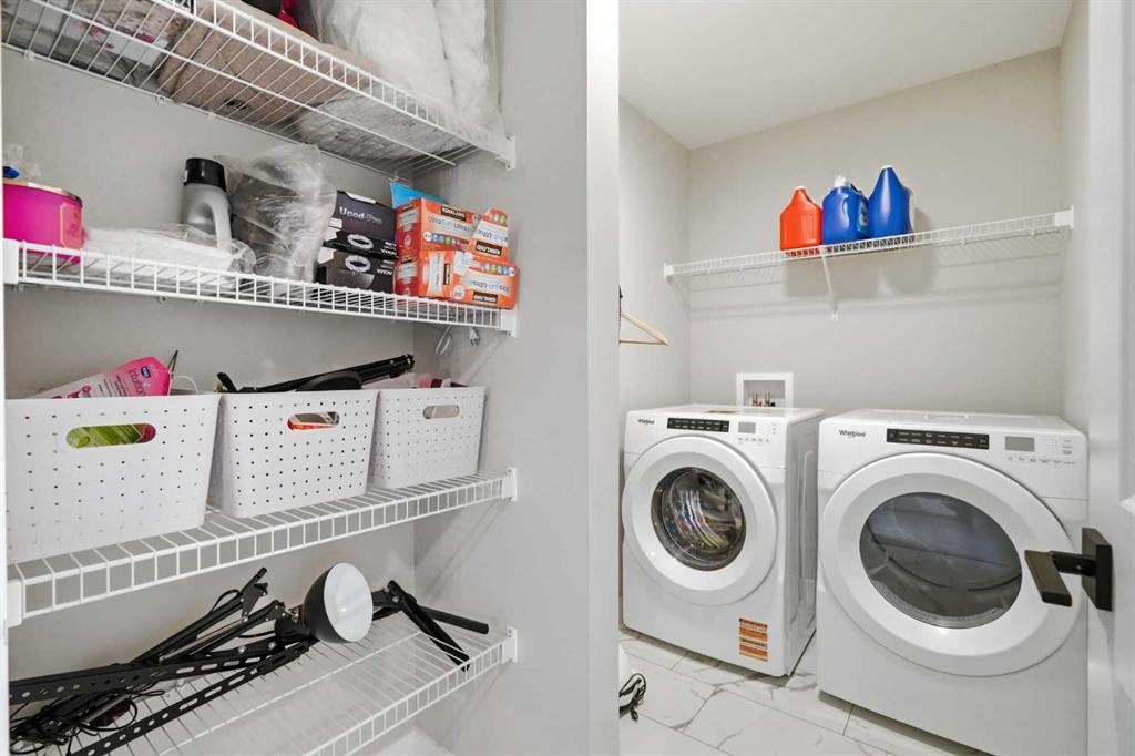 143 Belvedere Crescent Se, Calgary, AB - Indoor Photo Showing Laundry Room