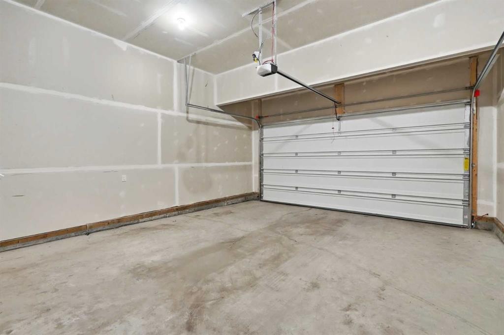 143 Belvedere Crescent Se, Calgary, AB - Indoor Photo Showing Garage