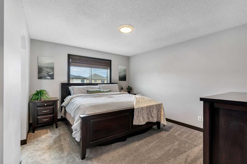 91 Panora Square Nw, Calgary, AB - Indoor Photo Showing Bedroom