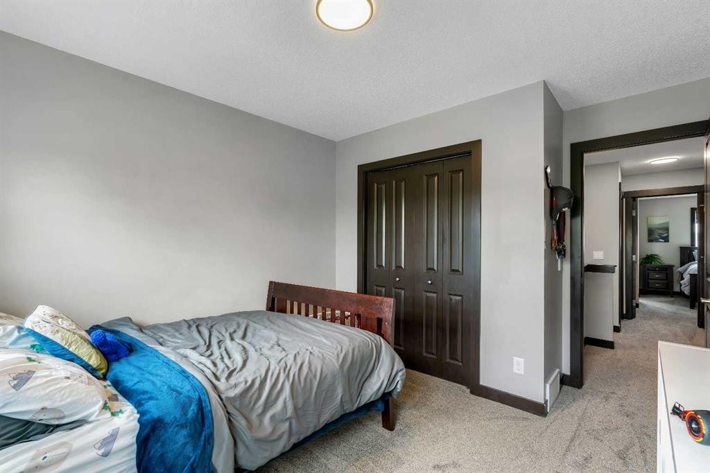 91 Panora Square Nw, Calgary, AB - Indoor Photo Showing Bedroom