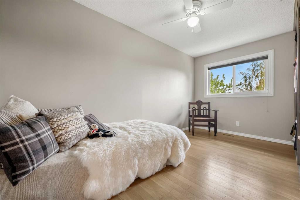 34 Cascade Place, Cochrane, AB - Indoor Photo Showing Bedroom