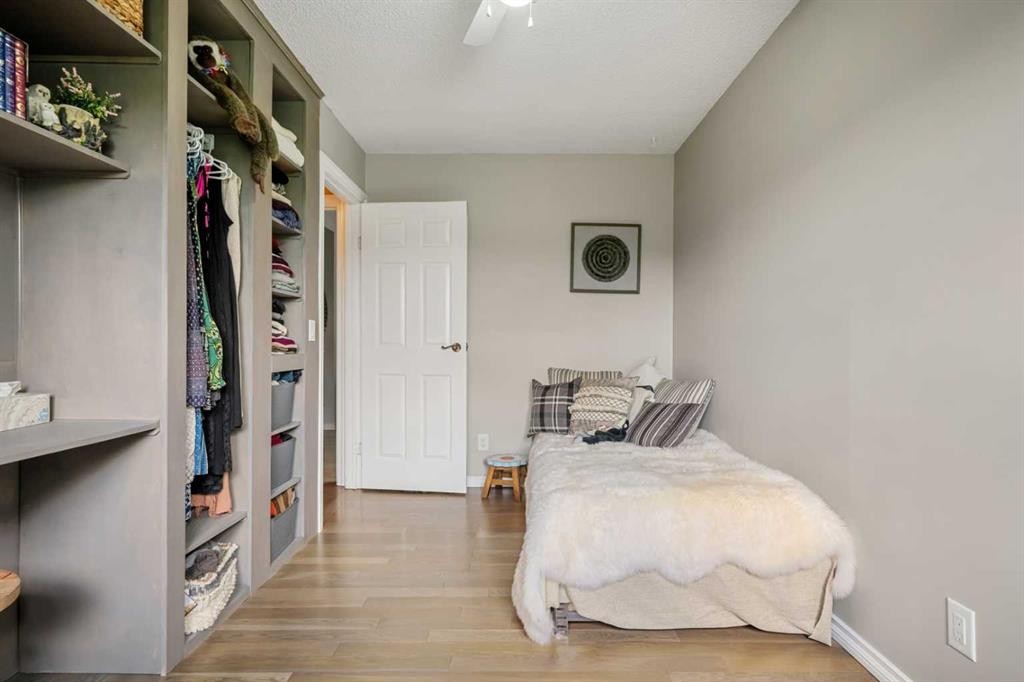 34 Cascade Place, Cochrane, AB - Indoor Photo Showing Bedroom