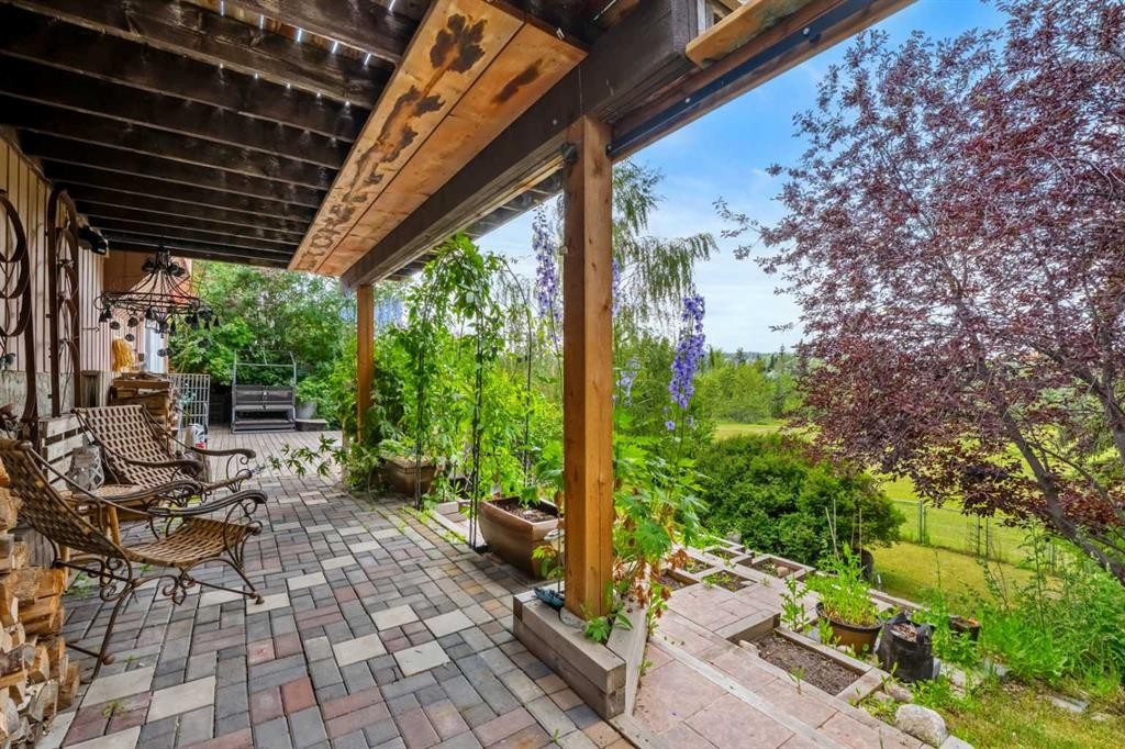 34 Cascade Place, Cochrane, AB - Outdoor With Deck Patio Veranda