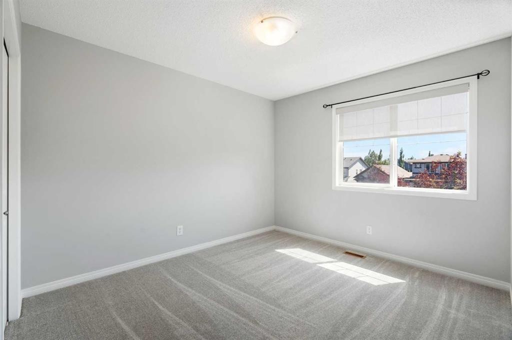 128 Silverado Way Sw, Calgary, AB - Indoor Photo Showing Other Room