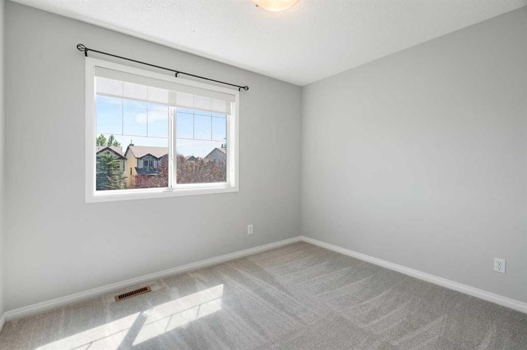 128 Silverado Way Sw, Calgary, AB - Indoor Photo Showing Other Room