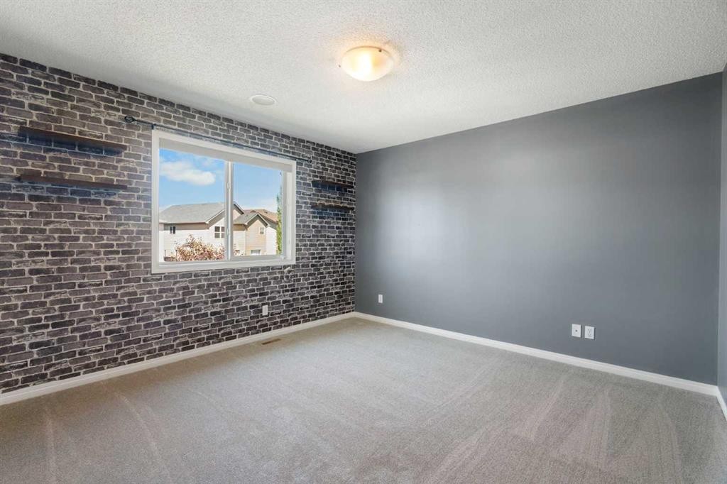 128 Silverado Way Sw, Calgary, AB - Indoor Photo Showing Other Room