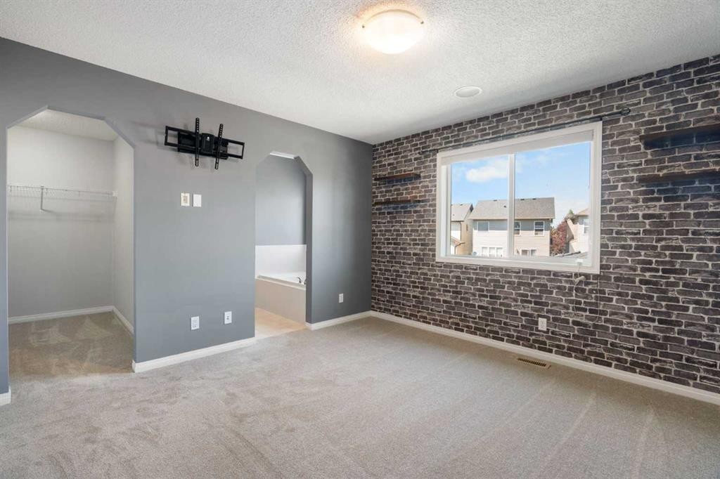 128 Silverado Way Sw, Calgary, AB - Indoor Photo Showing Other Room
