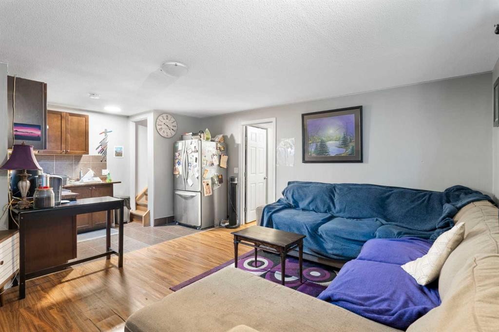 128 Silverado Way Sw, Calgary, AB - Indoor Photo Showing Living Room