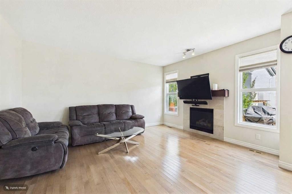 66 Nolanhurst Way Nw, Calgary, AB - Indoor Photo Showing Living Room With Fireplace