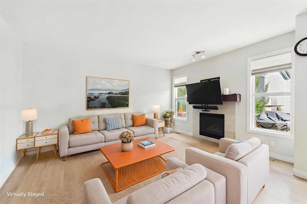 66 Nolanhurst Way Nw, Calgary, AB - Indoor Photo Showing Living Room With Fireplace