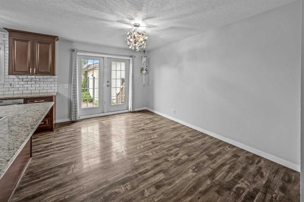 227 Manora Crescent Ne, Calgary, AB - Indoor Photo Showing Other Room