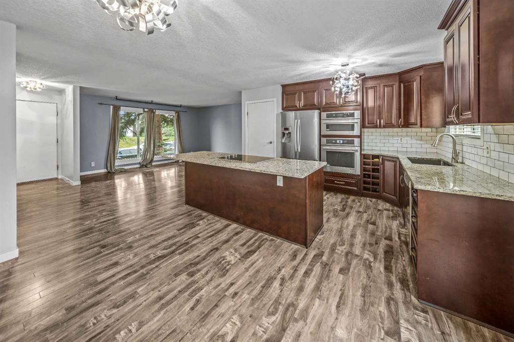 227 Manora Crescent Ne, Calgary, AB - Indoor Photo Showing Kitchen With Stainless Steel Kitchen
