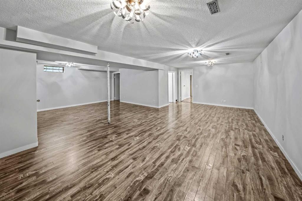 227 Manora Crescent Ne, Calgary, AB - Indoor Photo Showing Other Room