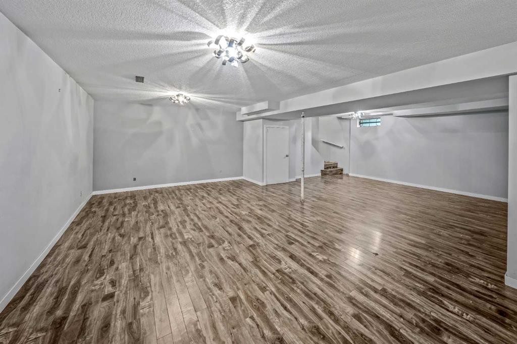 227 Manora Crescent Ne, Calgary, AB - Indoor Photo Showing Other Room