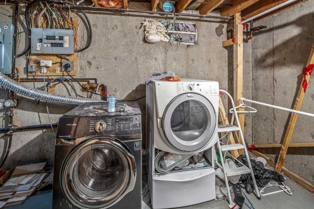 227 Manora Crescent Ne, Calgary, AB - Indoor Photo Showing Laundry Room