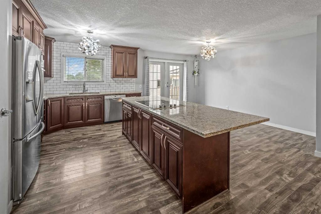 227 Manora Crescent Ne, Calgary, AB - Indoor Photo Showing Kitchen With Upgraded Kitchen