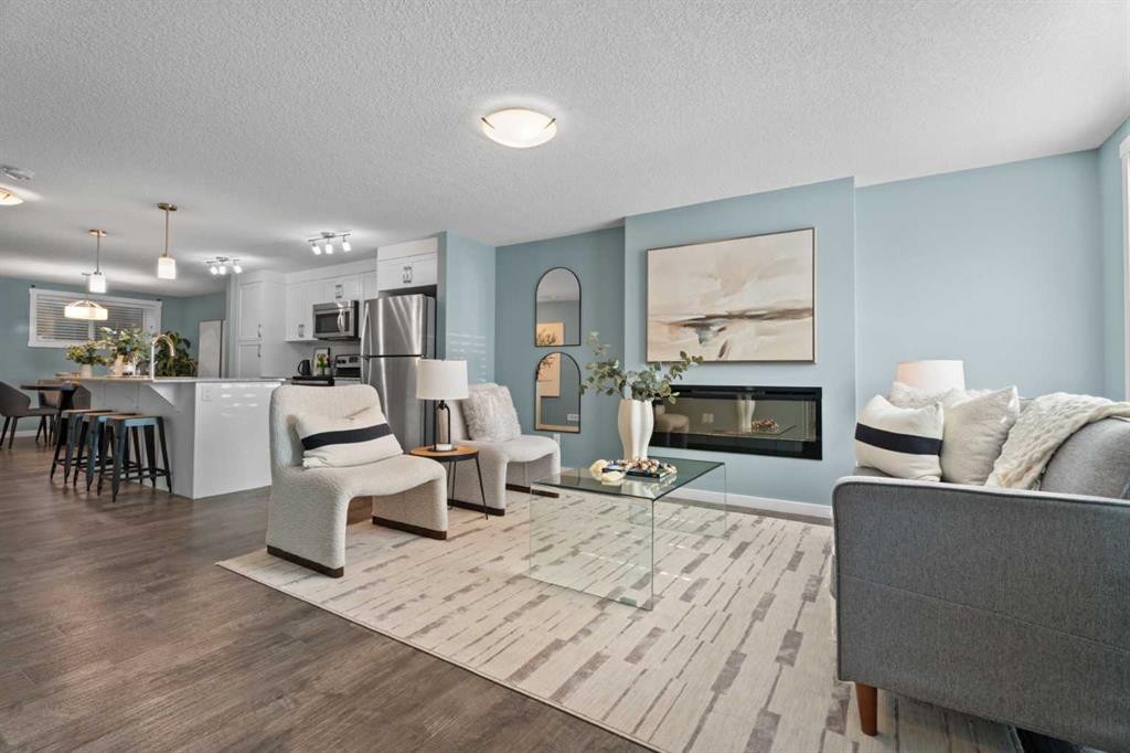 516 Auburn Bay Circle Se, Calgary, AB - Indoor Photo Showing Living Room With Fireplace
