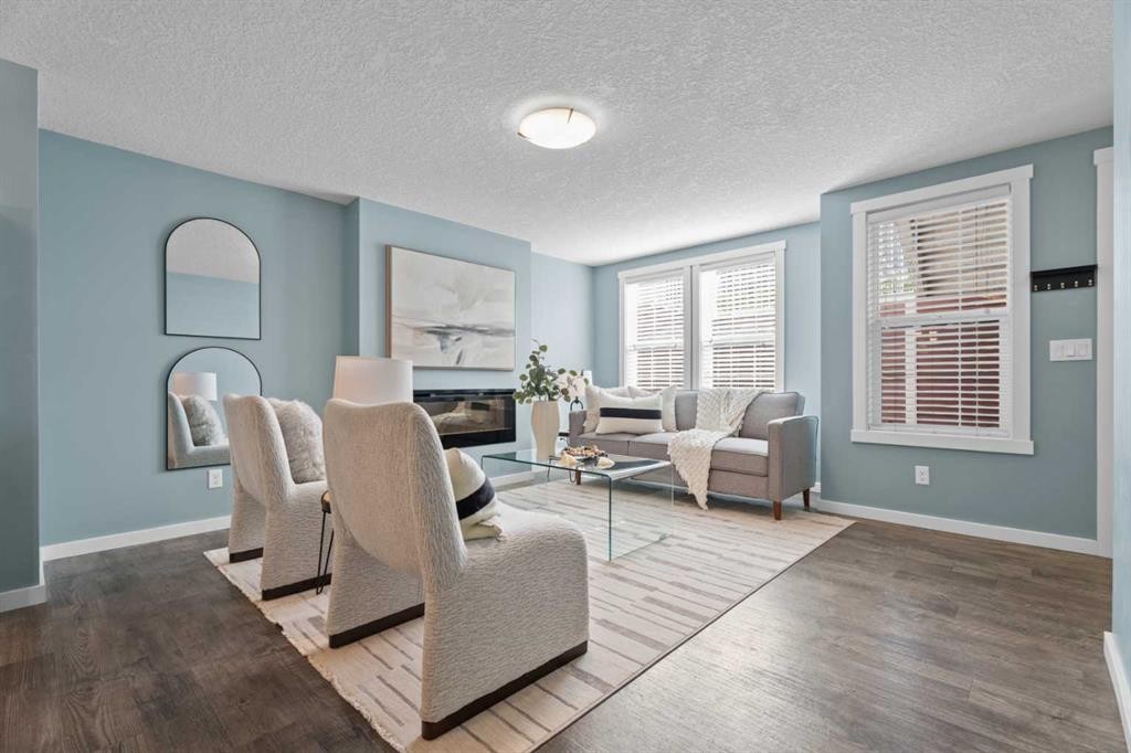 516 Auburn Bay Circle Se, Calgary, AB - Indoor Photo Showing Living Room With Fireplace