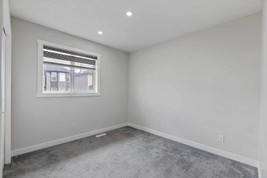 124 Saddlecrest Boulevard Ne, Calgary, AB - Indoor Photo Showing Other Room