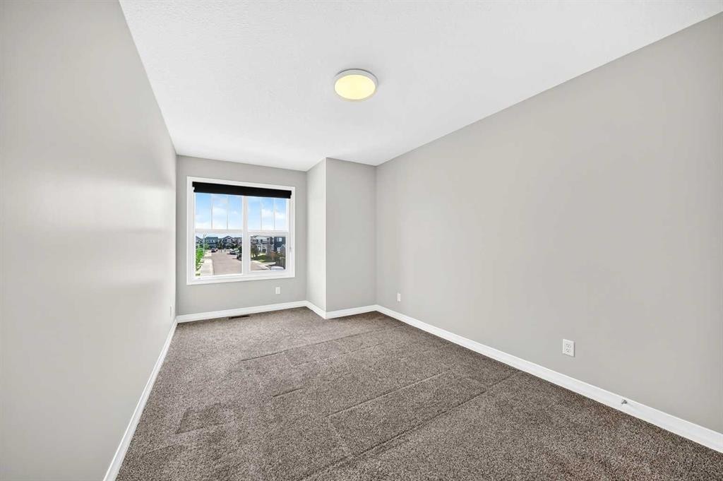 293 Red Sky Way Ne, Calgary, AB - Indoor Photo Showing Other Room