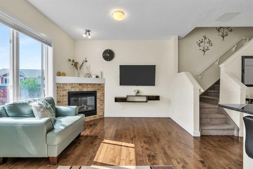 43 Sage Hill Common Nw, Calgary, AB - Indoor Photo Showing Living Room With Fireplace